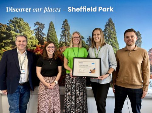 Wealden Staff being presented with gold Wellbeing at Work award